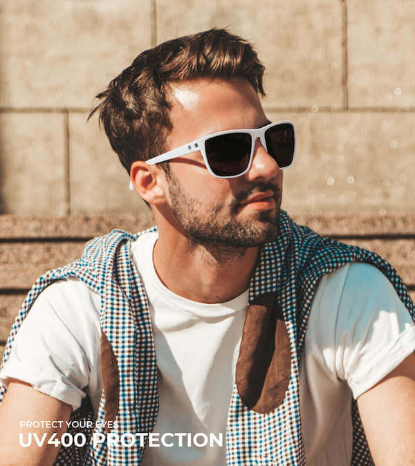 A man wearing kaliyadi classic rectangle sunglasses (white frame + black lens + white temples)